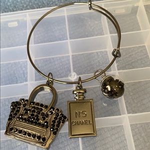 Black bangle with charms